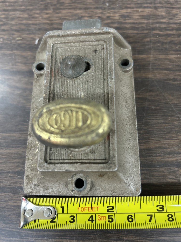 Vintage ILCO spring loaded lockable deadbolt lock with brassy turn knob