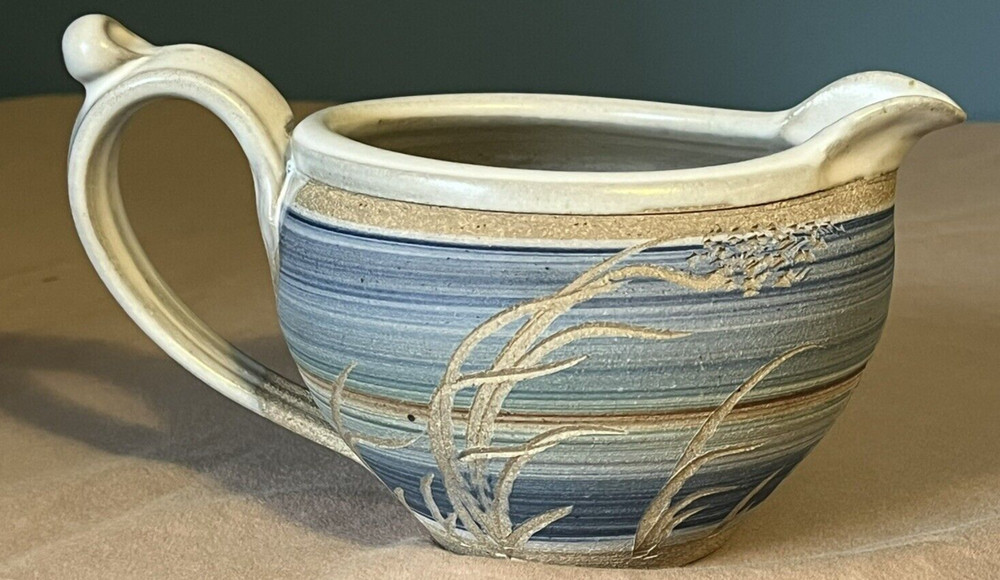 Pottery: Blue, Brown, and Cream Small Pitcher