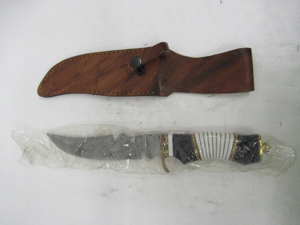 Damascus Noon Knife with sheath.