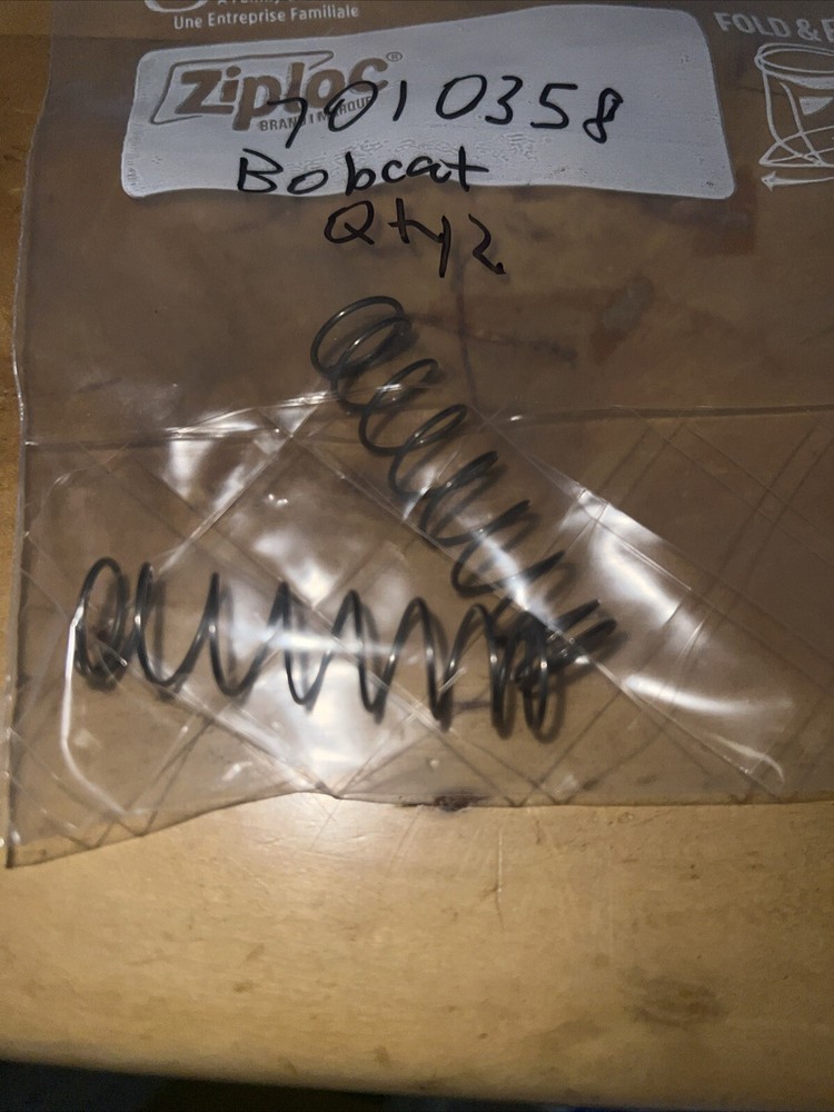 Bobcat Quantity Two WINDOW LATCH SPRING, 7010358