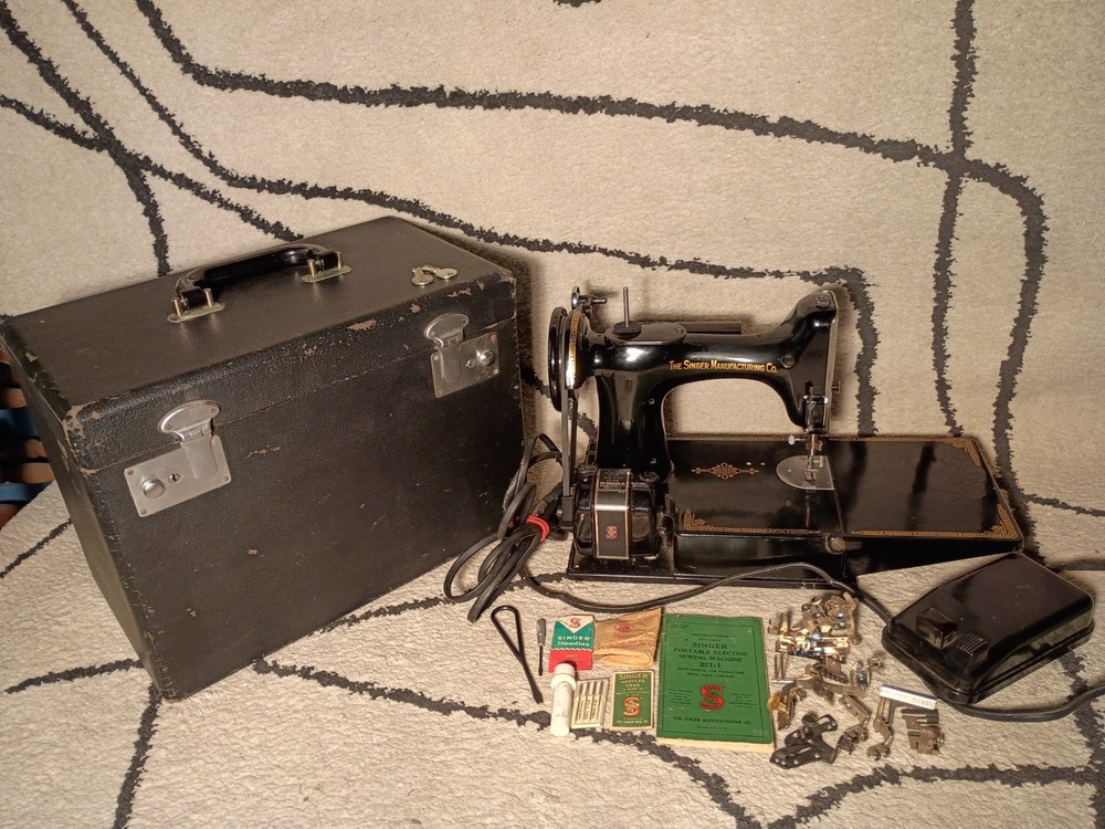 1952 singer featherweight sewing machine.