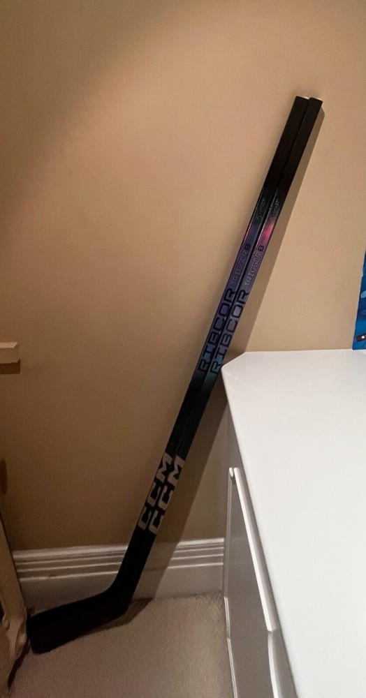Two CCM Trigger 8 pro hockey sticks