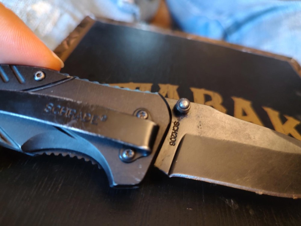Schrade Folding Pocket Knife with Black Handle