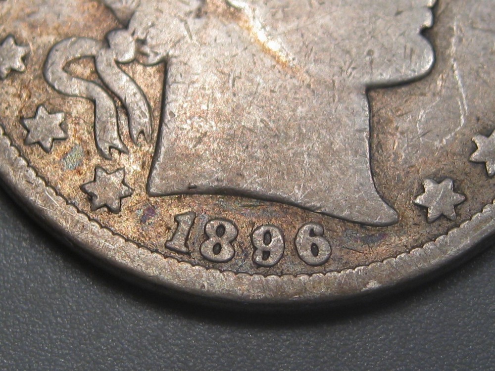 Better-date 1896-o Silver BARBER Half Dollar.