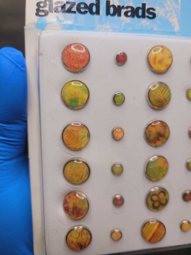 BasicGrey Year (2008) glazed brads, 24 pieces