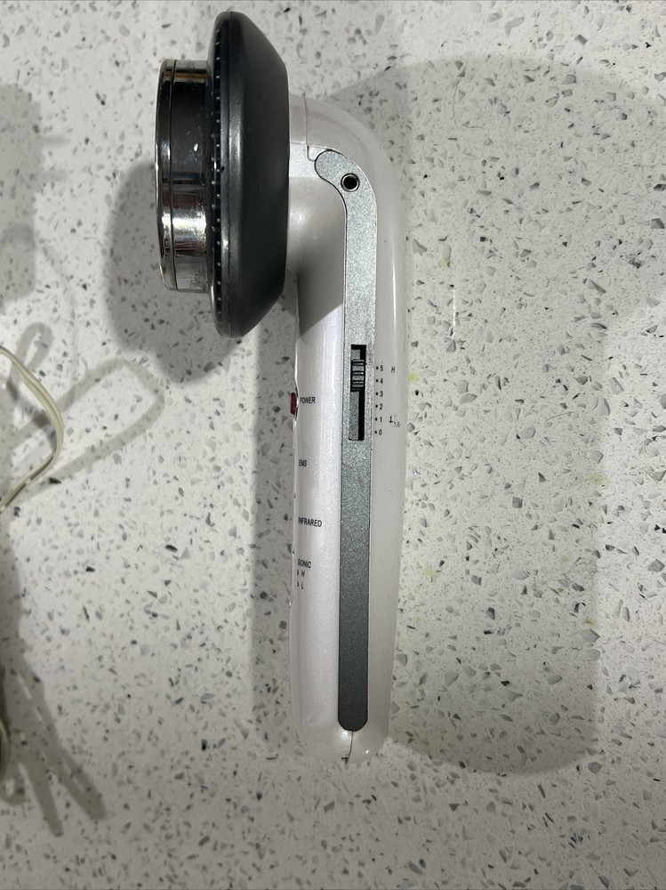 Inferated handheld utrasonic microcurrent machine