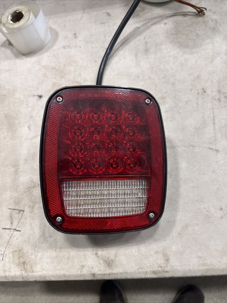 Combination stop/turn/tail/back-up light, hard wired, passenger side