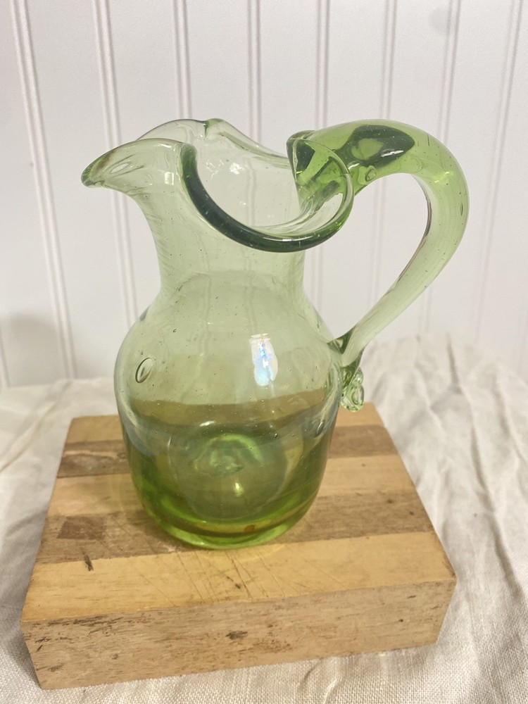 green glass pitcher vintage