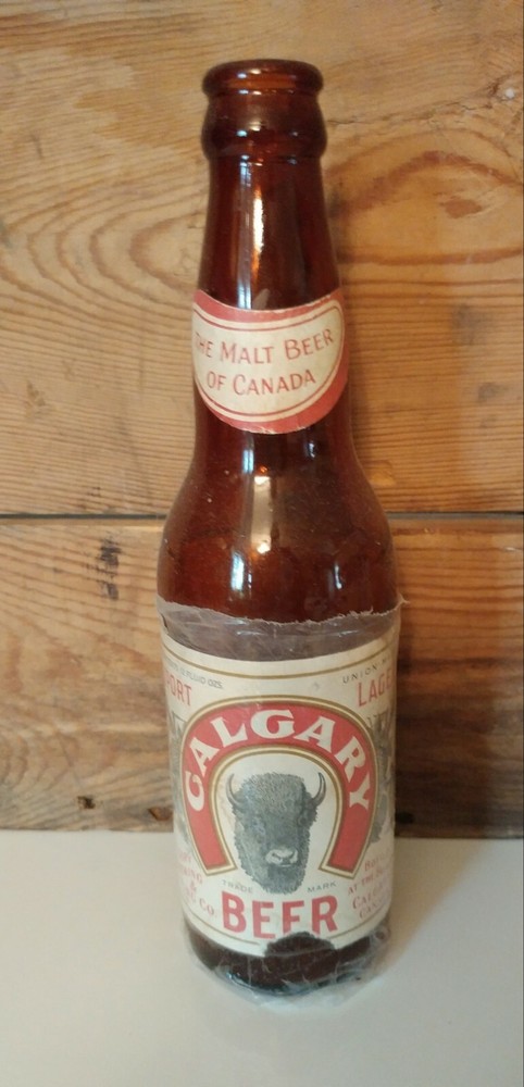 VINTAGE CALGARY BEER PAPER LABEL BEER BOTTLE