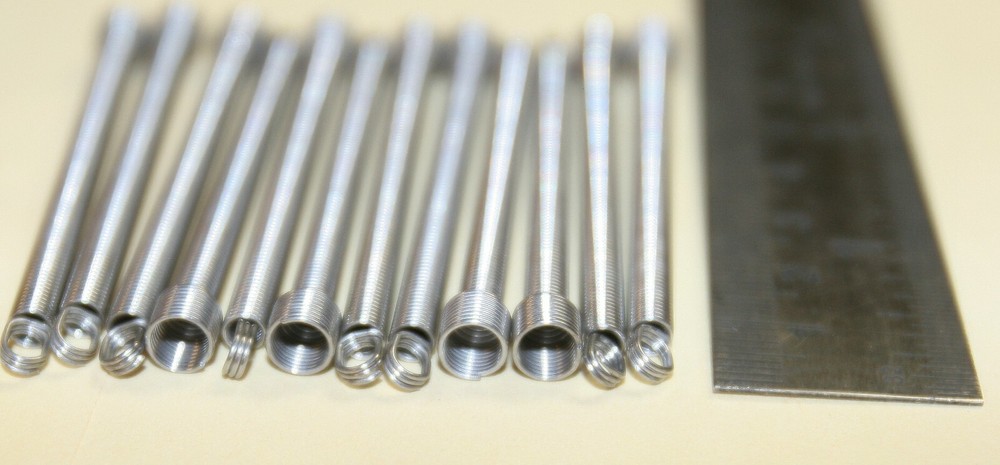 ESD coin chute return spring replacements - 12 pack - part no. 20963