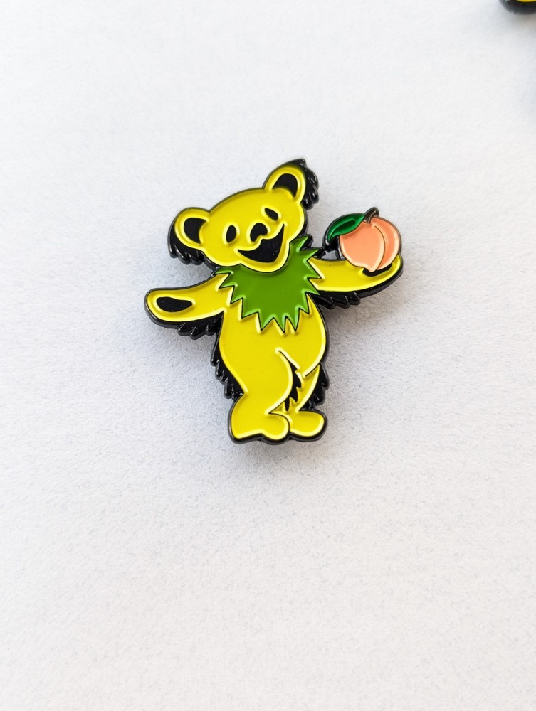 Grateful Dead Dancing Bear Peach Pin. Yellow