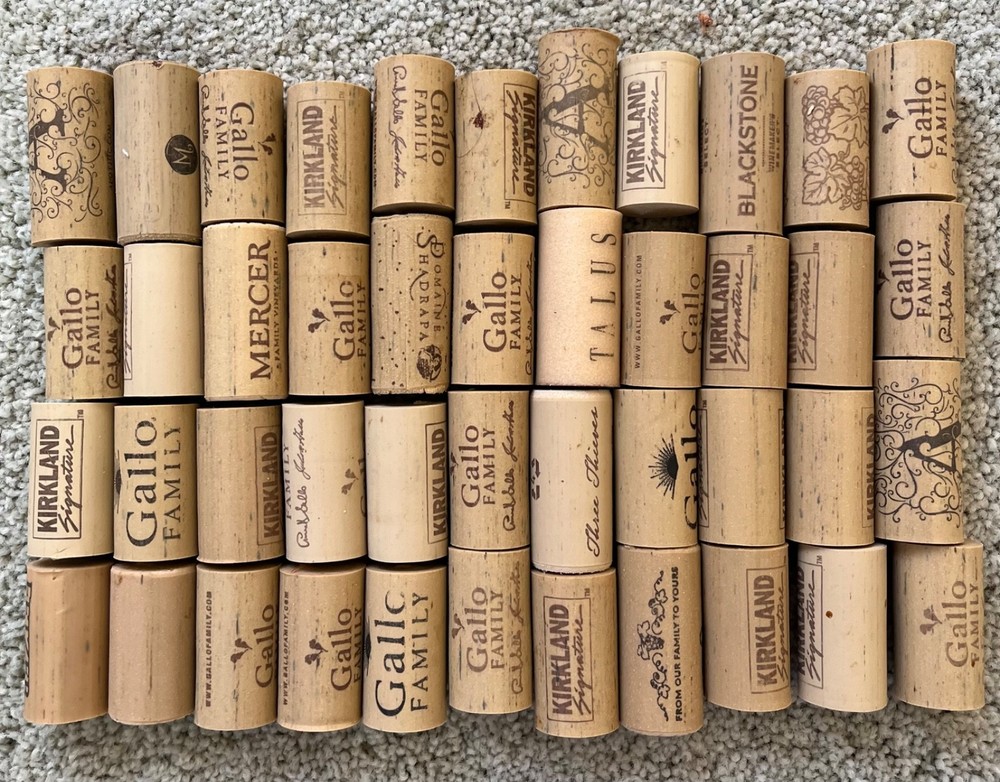 45 Synthetic wine corks - used
