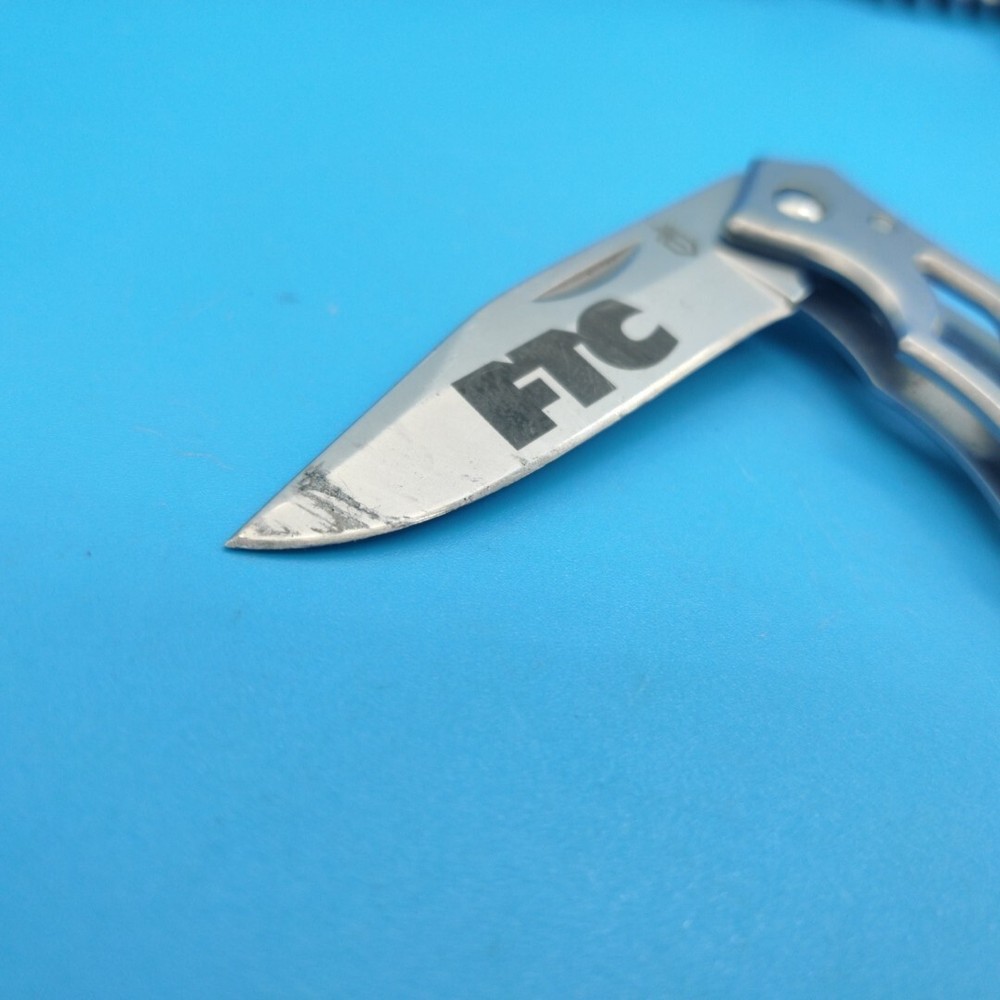 USED GERBER FOLDING PARAFRAME KNIFE SILVER BLADE