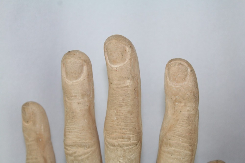 Plaster bookends Reading Hands