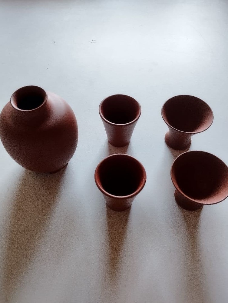 Reddish-brown ceramic sake bottle and 4-piece choko set