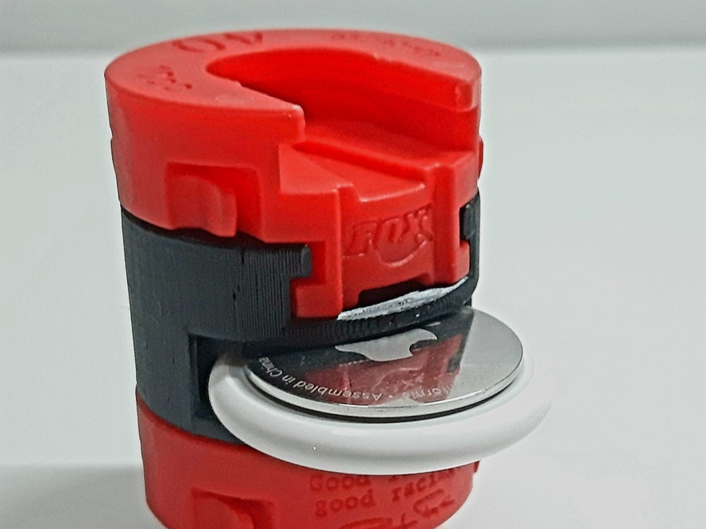 Fox 40 fork Airtag holder volume reducer token