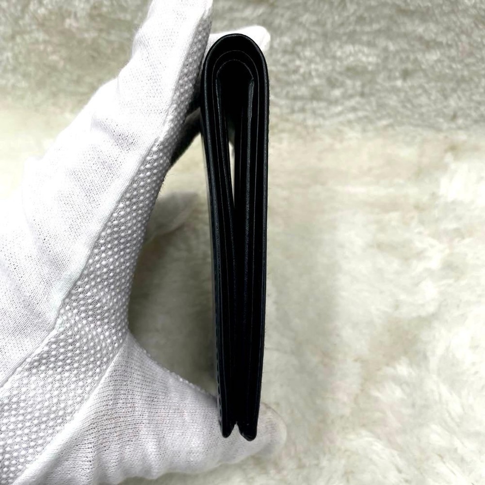 GUCCI Embossed Logo Black Folding Wallet