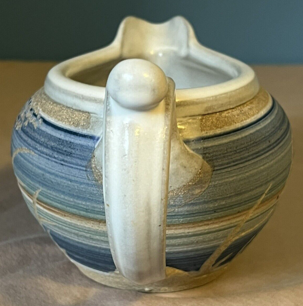 Pottery: Blue, Brown, and Cream Small Pitcher