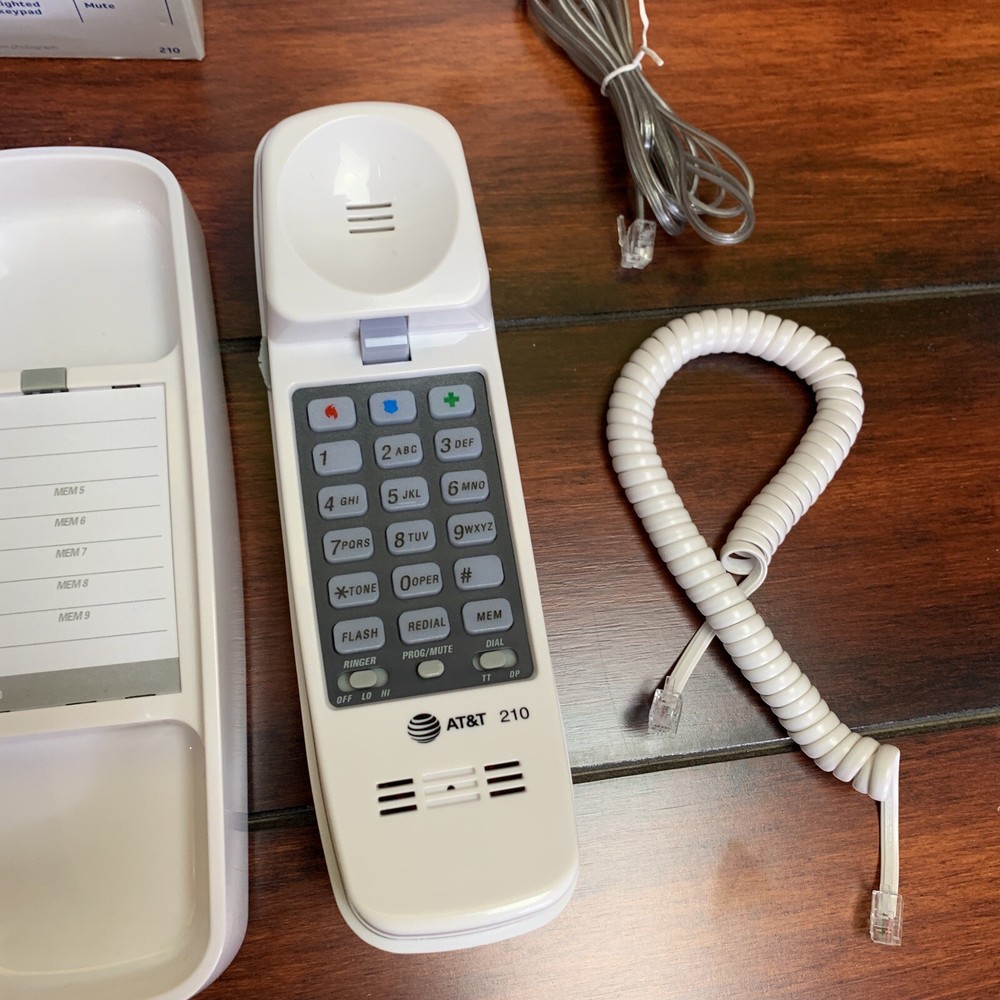 AT&T 210 Basic Trimline Corded Phone, Wall-Mountable, 7 ft Line, Emergency Power