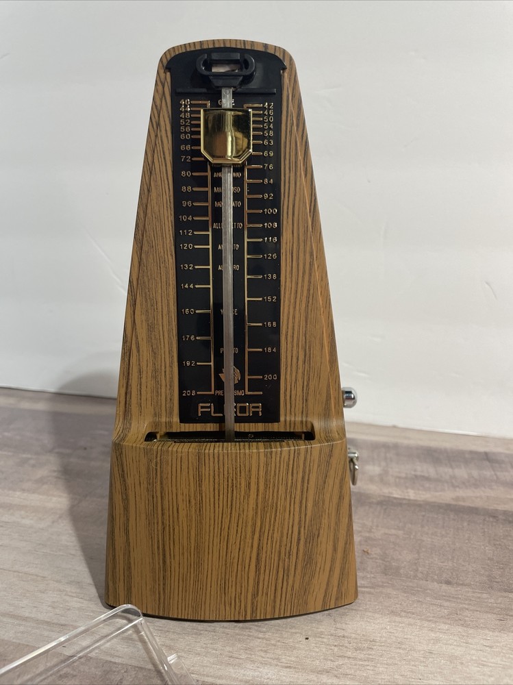 FLEOR METRONOME MODEL- WORKS GREAT WOOD GRAIN PLASTIC BODY