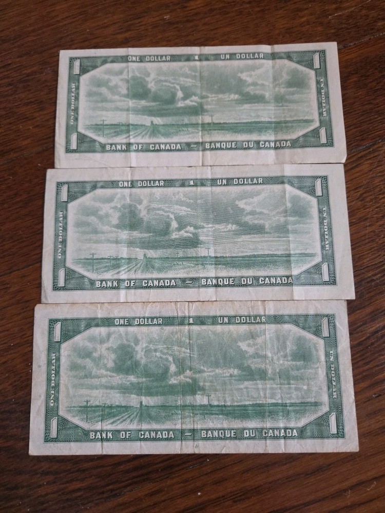 Three 1954 Canadian One Dollar Bills