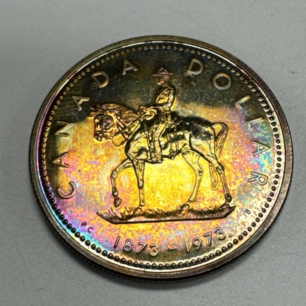 1973 Canada $1 Silver Dollar RCMP Rainbow Toning