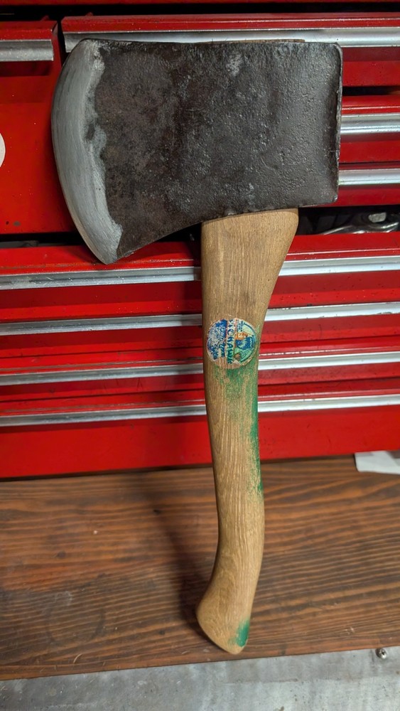 Kelly works axe and tool