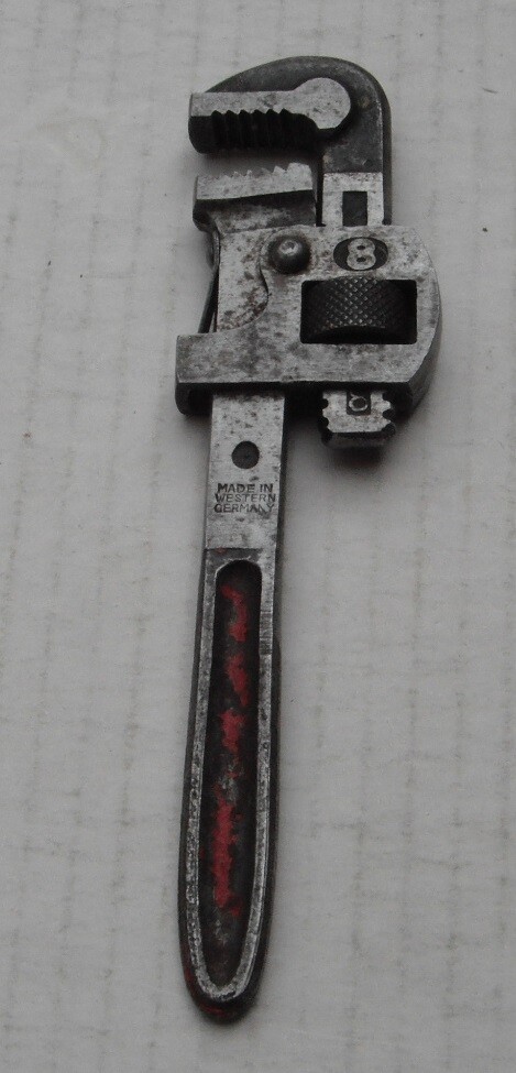 Small adjustable pipe wrench marked No 8...West Germany....old er