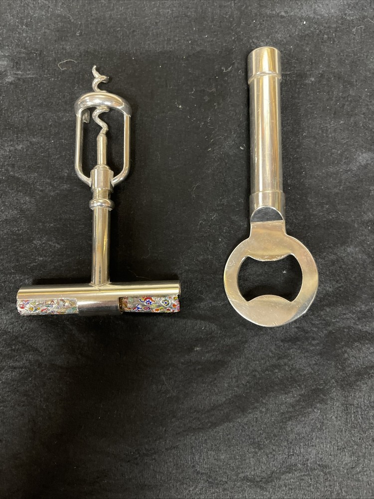 Silver corkscrew and bottle opener with blown glass insert