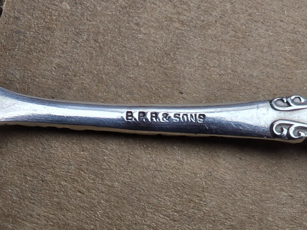 ANTIQUE E.P. ROBERTS & SONS FLORAL REPOUSSE SPOON STERLING SILVER