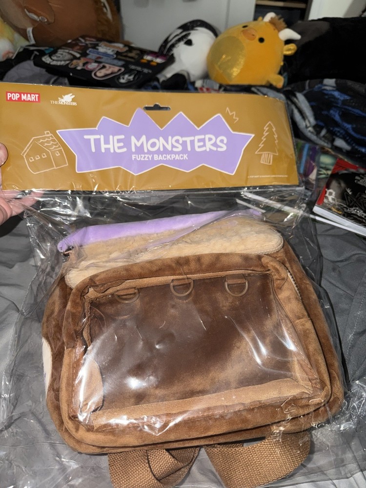 The Monsters Fuzzy Backpack