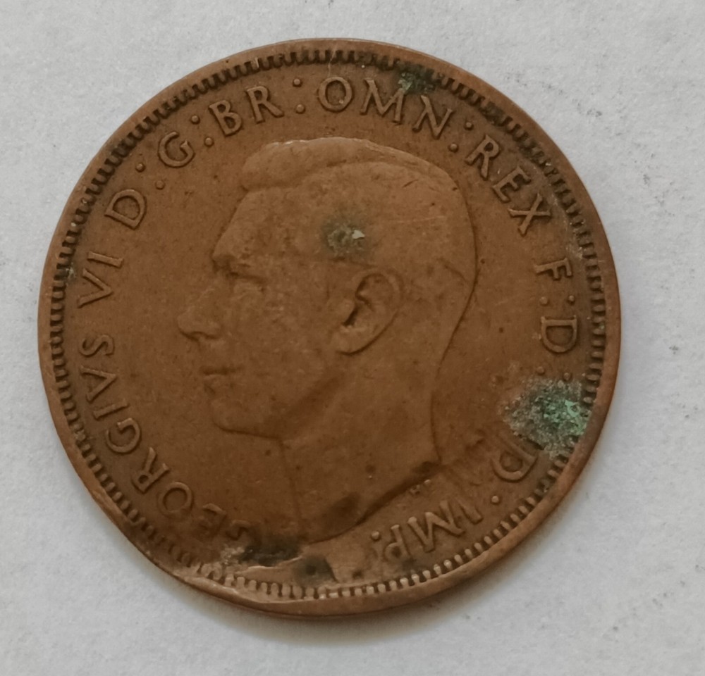 George V and George VI coins with error