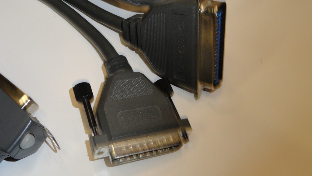 QQ1: HP JetDirect 200N LIO Printer Server C6502A with cable