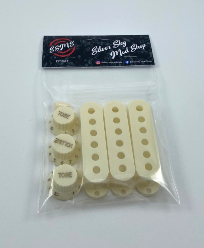 Silver Sky pickup covers, knobs and swicth parchment