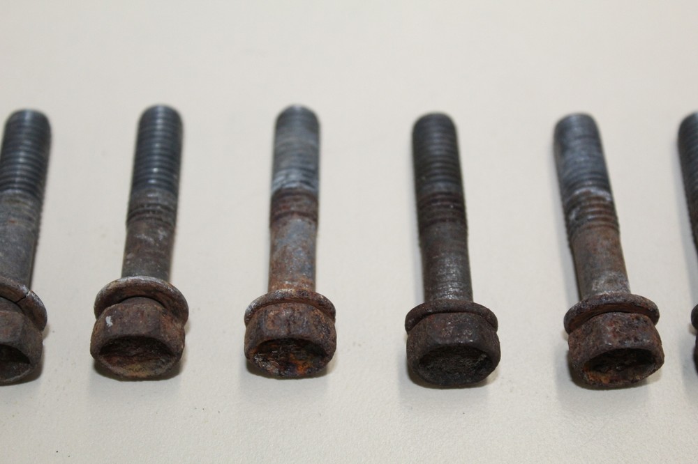 1985 Suzuki GS700ES OEM EXHAUST HEADER BOLTS & MISC HARDWARE