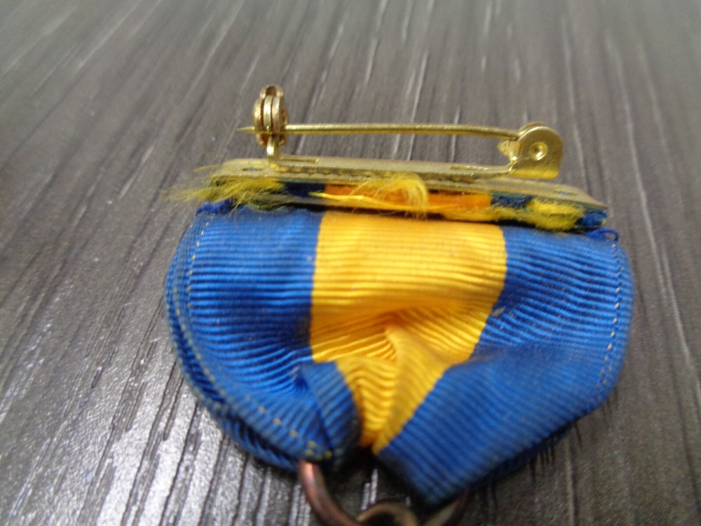 Vintage Bugle Roster Medal DISTINGUISHED