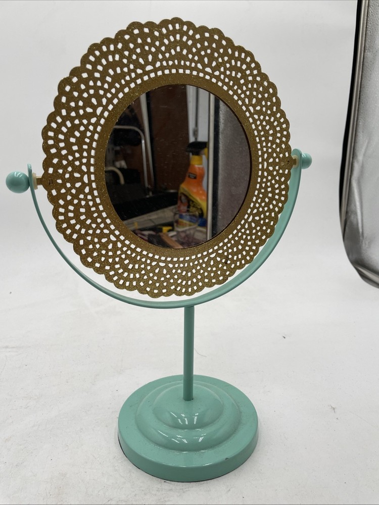 Vintage Tabletop Mirror With Gold Frame And A Blue Base