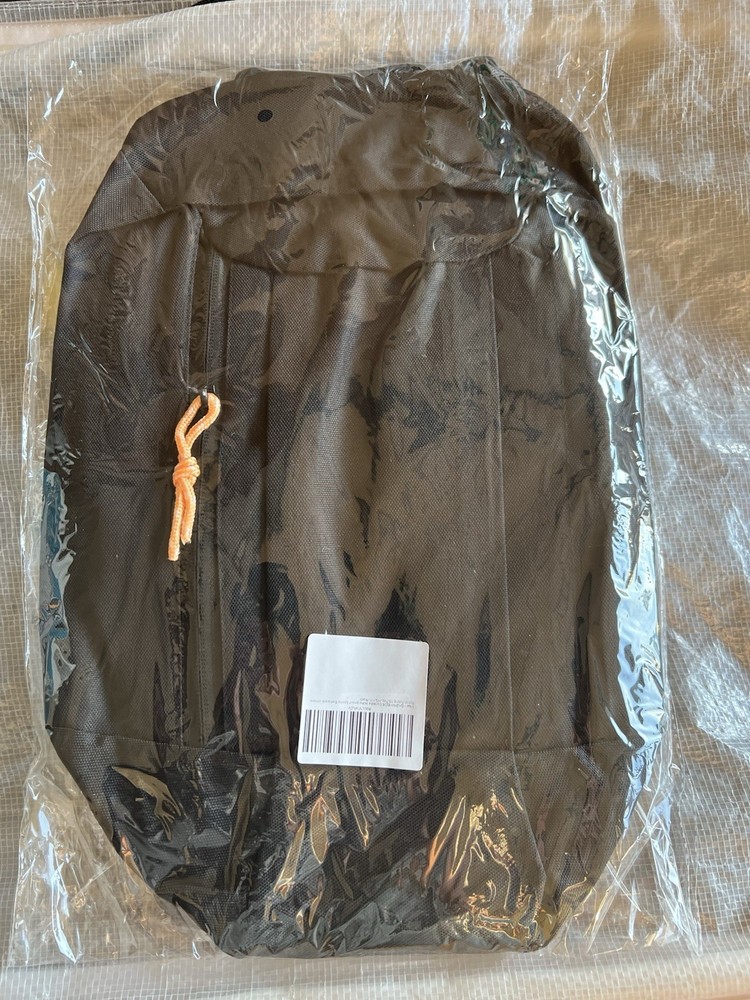 Black Tactical Backpack for Kids in Plastic Packaging with Barcode