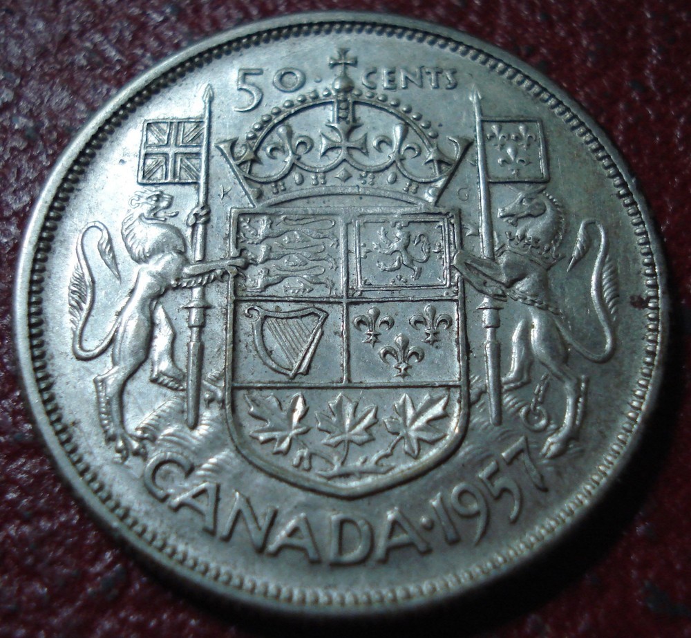 1957 CANADA 50 CENTS IN VF CONDITION