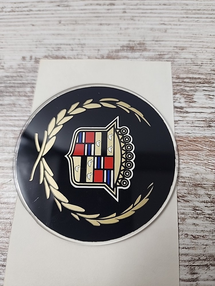 Black Background Cadillac Logo On Hard Plastic