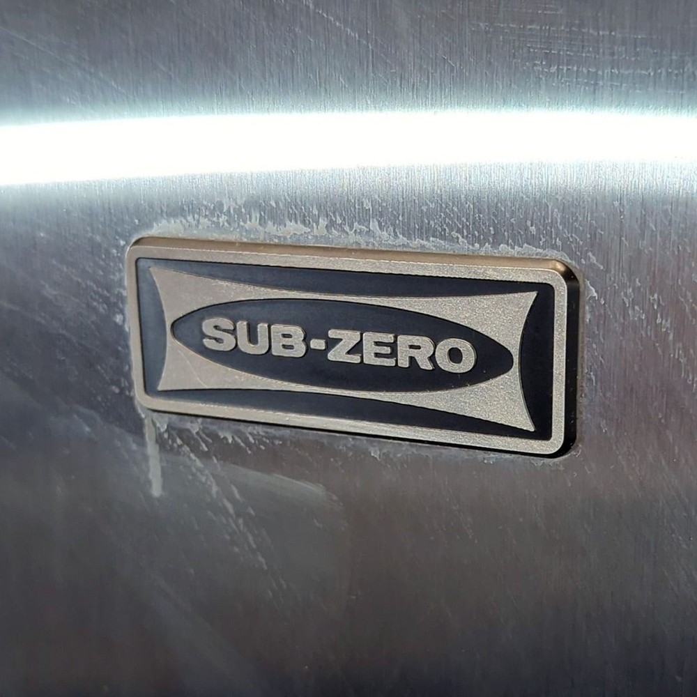 Sub-Zero Stainless Steel Side-by-Side Refrigerator with Ice Dispenser