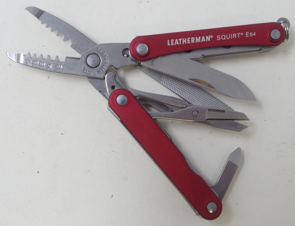 Retired Red Leatherman Squirt ES4 Multi-Tool Pocket Knife - TSA Auction