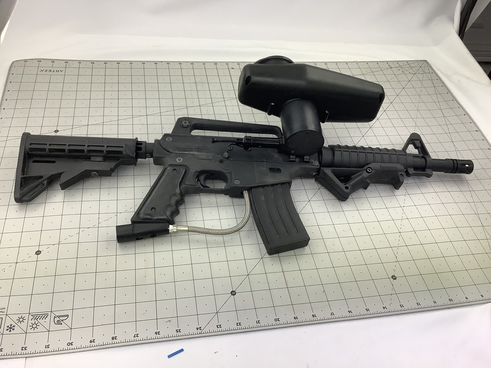 Tippmann Alpha black paintball marker with e trigger and cyclone feed untested