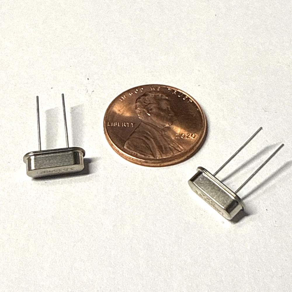 2 pcs 7.040 MHz Crystal. HC49/S