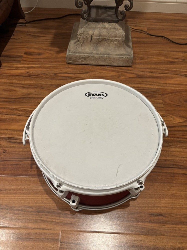 Evans 12" Round Red Drum Drumhead with World Max Drum Support System