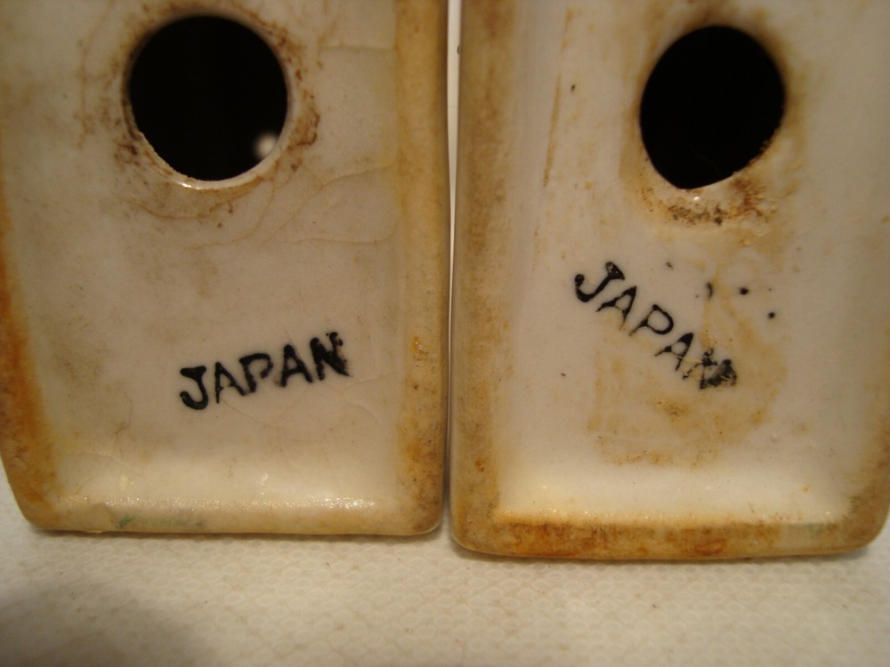 White porcelain book shape salt & pepper shaker set.