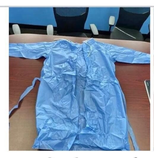 $1 disposable lab coats - 100/box