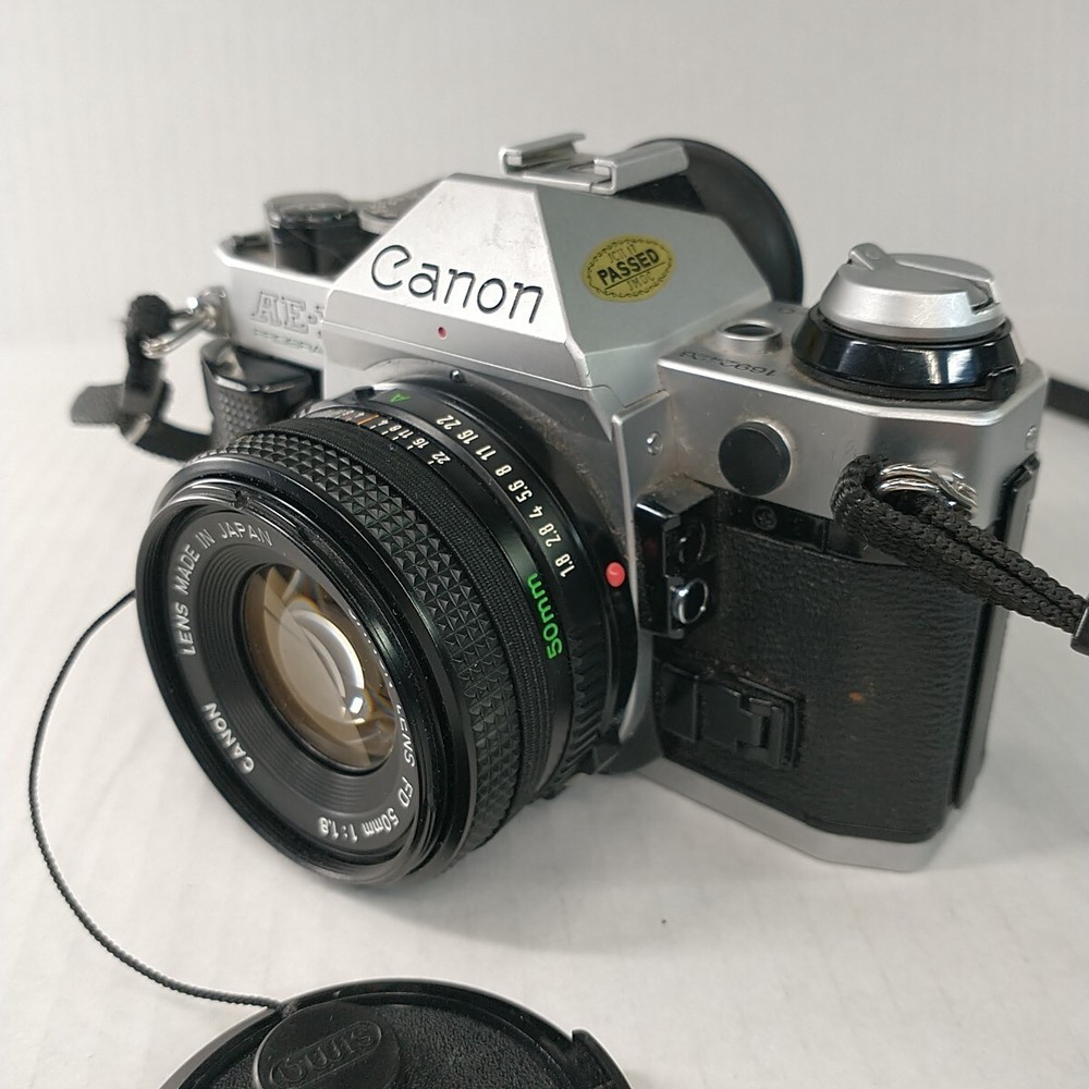 Canon AE-1 Program 35mm Camera Bundle With 50mm / 135 Lens Strap & Camera Bag