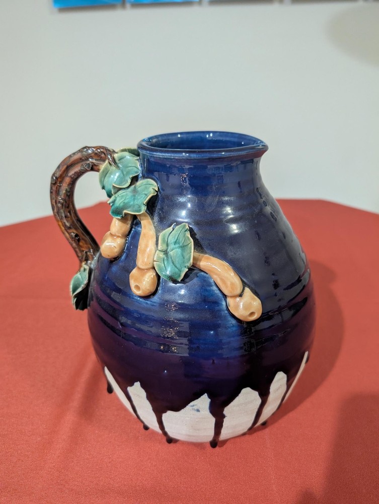 Artisan Ceramic Pitcher with Leaf Design