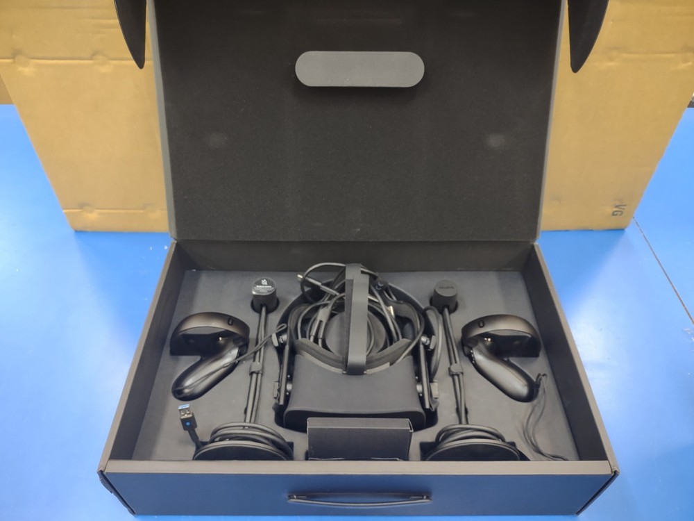 Oculus Rift VR Headset with controllers, sensors, and original box